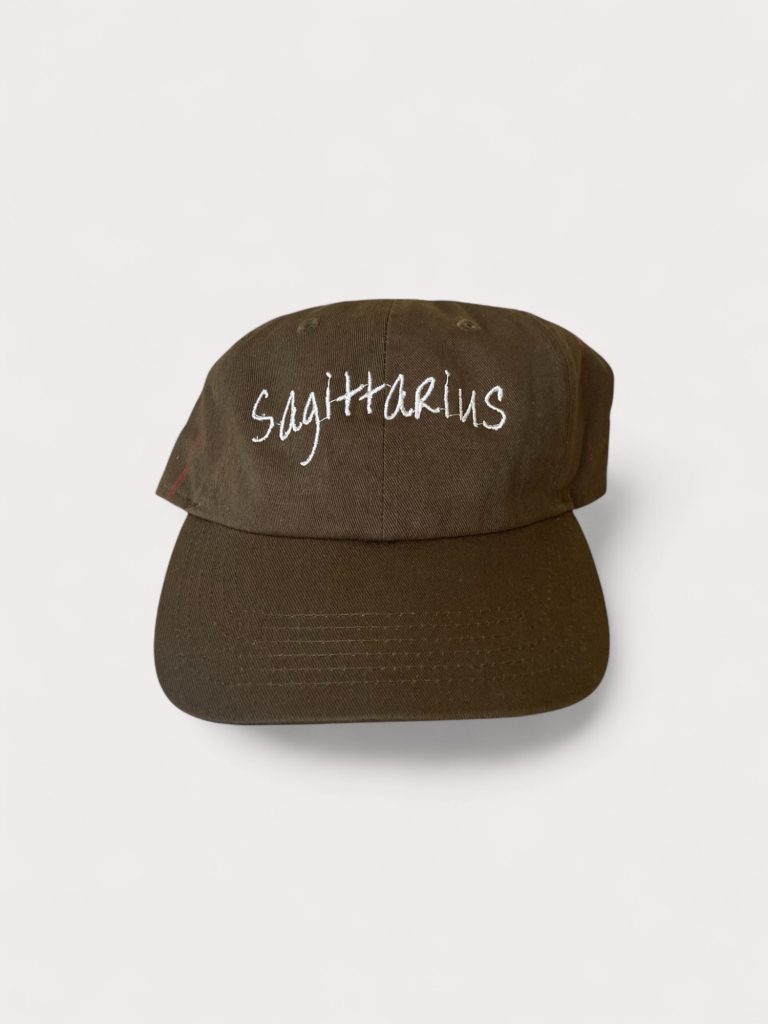 Olive green cap embroidered with 'Sagittarius'