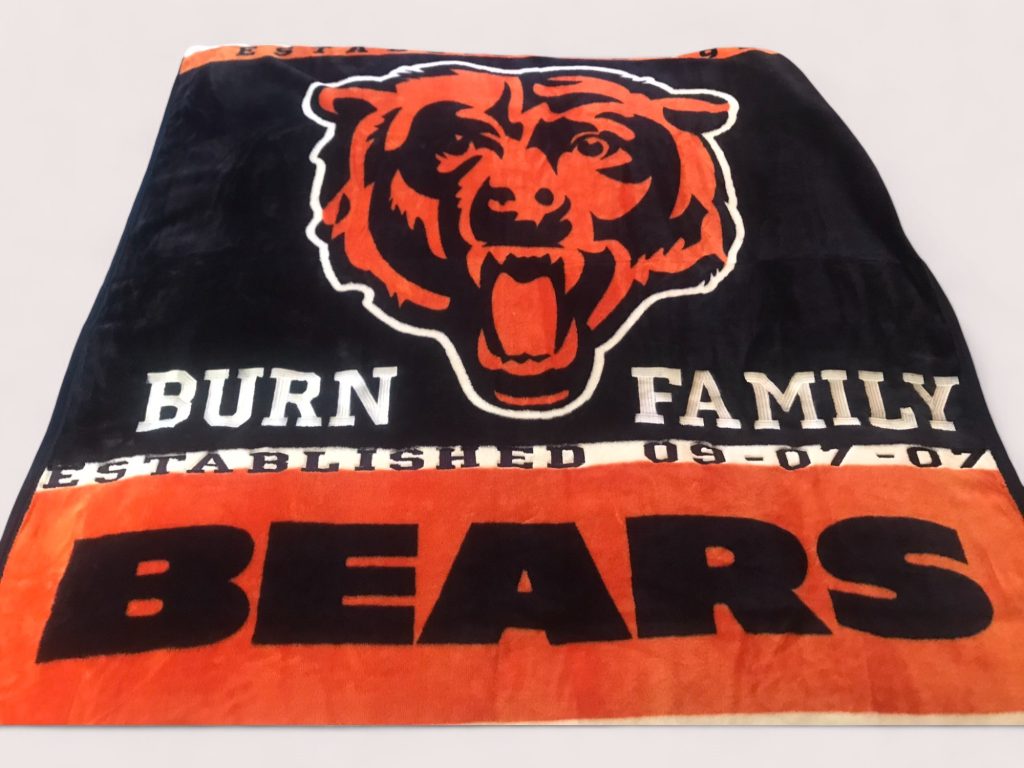 Black and orange Bears blanket embroidered with Burn Family and established date