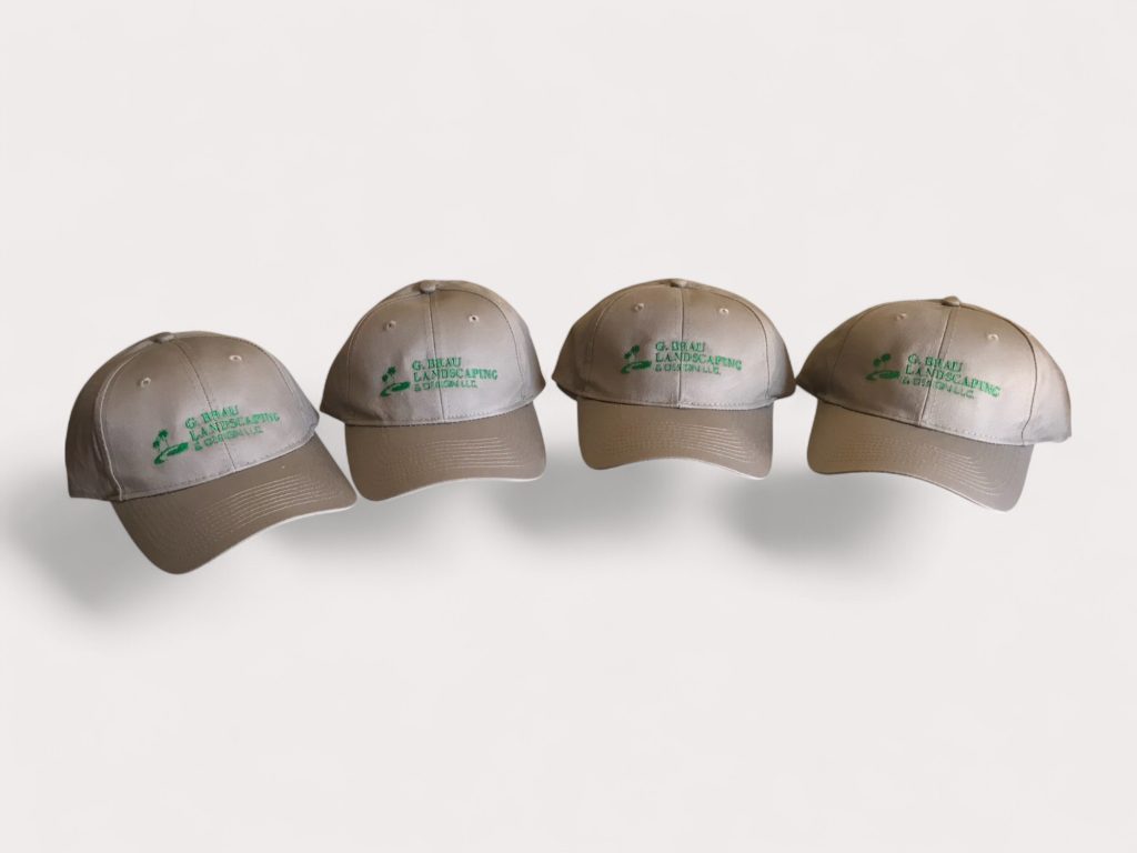 Four tan embroidered hats for G. Braw Landscaping & Design LLC