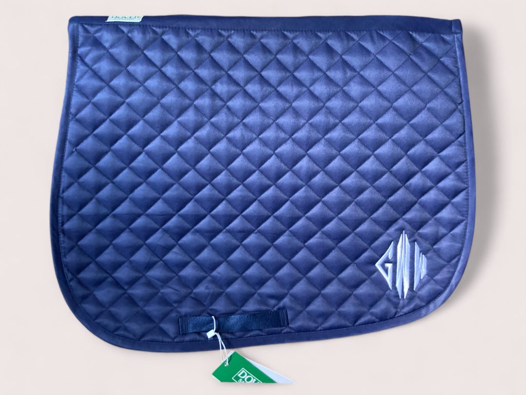 Navy blue saddle pad embroidered with initials GWW